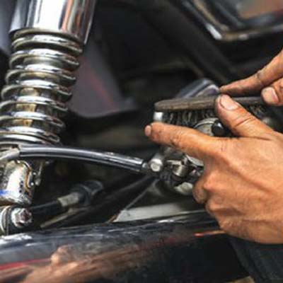 Motorcycle discount shocker repairing